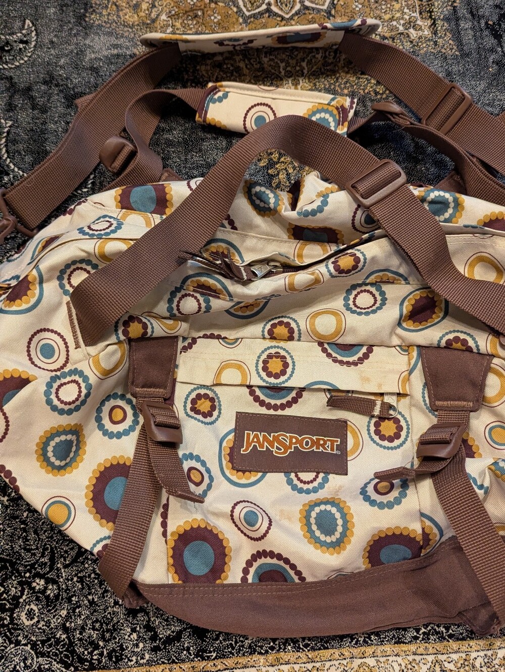 JanSport Cream Vintage- Style Patterned Duffel Bag with Brown Straps